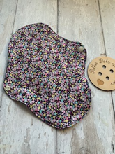 Load image into Gallery viewer, My sanitary towels are made from a top layer of organic cotton jersey that draws the liquid away, the inner core is organic bamboo fleece velour fabric which is highly absorbent, then a layer of PUL which is a breathable waterproof fabric and then of course pretty cotton fabric on the bottom. These high quality, eco friendly fabrics are anti-bacterial, anti-odour and therefore kind to your skin as well as the environment. They are secured with a plastic snap. Washing Instructions - it is best to wash thes