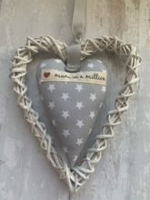 Load image into Gallery viewer, These small hanging hearts are the perfect way to show your love and appreciation to your mum. They look great hung on a wall, door handle or gifted around the neck of a bottle of wine, fizz or bubble bath. They measure approx 13x9cm  Available with any name (hand stamped) and on their own, or in a wicker heart.
