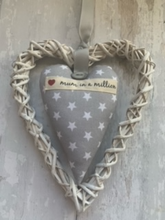 Load image into Gallery viewer, These small hanging hearts are the perfect way to show your love and appreciation to your mum. They look great hung on a wall, door handle or gifted around the neck of a bottle of wine, fizz or bubble bath. They measure approx 13x9cm  Available with any name (hand stamped) and on their own, or in a wicker heart.