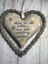 Load image into Gallery viewer, 'Mums are like buttons...they hold everything together' These large hanging hearts look good all year round hung on a wall, on a door handle, or gifted around the neck of a bottle of wine, fizz or bubble bath.   They measure approx. 20x20cm  Available on their own, or in a wicker heart (26x26cm)