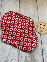 Load image into Gallery viewer, My sanitary towels are made from a top layer of organic cotton jersey that draws the liquid away, the inner core is organic bamboo fleece velour fabric which is highly absorbent, then a layer of PUL which is a breathable waterproof fabric and then of course pretty cotton fabric on the bottom. These high quality, eco friendly fabrics are anti-bacterial, anti-odour and therefore kind to your skin as well as the environment. They are secured with a plastic snap. Washing Instructions - it is best to wash thes