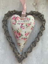 Load image into Gallery viewer, These small hanging hearts are the perfect way to show your love and appreciation to your mum. They look great hung on a wall, door handle or gifted around the neck of a bottle of wine, fizz or bubble bath. They measure approx 13x9cm  Available with any name (hand stamped) and on their own, or in a wicker heart.