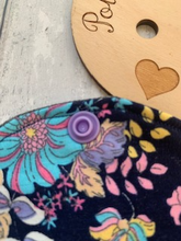 Load image into Gallery viewer, My sanitary towels are made from a top layer of organic cotton jersey that draws the liquid away, the inner core is organic bamboo fleece velour fabric which is highly absorbent, then a layer of PUL which is a breathable waterproof fabric and then of course pretty cotton fabric on the bottom. These high quality, eco friendly fabrics are anti-bacterial, anti-odour and therefore kind to your skin as well as the environment. They are secured with a plastic snap. Washing Instructions - it is best to wash thes