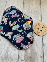 Load image into Gallery viewer, My sanitary towels are made from a top layer of organic cotton jersey that draws the liquid away, the inner core is organic bamboo fleece velour fabric which is highly absorbent, then a layer of PUL which is a breathable waterproof fabric and then of course pretty cotton fabric on the bottom. These high quality, eco friendly fabrics are anti-bacterial, anti-odour and therefore kind to your skin as well as the environment. They are secured with a plastic snap. Washing Instructions - it is best to wash thes
