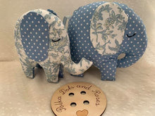 Load image into Gallery viewer, A kit containing everything you need to make a pair of elephants with step by step photo instructions.  The largest elephant stands approx. 14cm tall.
