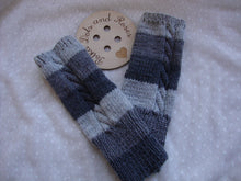 Load image into Gallery viewer, Merino wool is naturally fine, soft and incredibly warm.  These are designed to be worn all day and keep your wrists, hands and fingers (even though they’re not covered) warm.Will fit all hand sizes with a hole for your thumb.  They are great if you suffer from poor circulation or Raynauds.  Lovingly hand knitted by my wonderful mum ♥️
