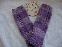 Load image into Gallery viewer, Merino wool is naturally fine, soft and incredibly warm.  These are designed to be worn all day and keep your wrists, hands and fingers (even though they’re not covered) warm.Will fit all hand sizes with a hole for your thumb.  They are great if you suffer from poor circulation or Raynauds.  Lovingly hand knitted by my wonderful mum ♥️