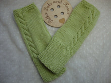 Load image into Gallery viewer, Merino wool is naturally fine, soft and incredibly warm. These are designed to be worn all day and keep your wrists, hands and fingers (even though they’re not covered) warm.Will fit all hand sizes with a hole for your thumb. They are great if you suffer from poor circulation or Raynauds. Lovingly hand knitted by my wonderful mum ♥️