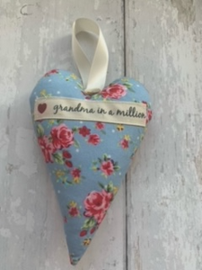These small hanging hearts are the perfect way to show your love and appreciation to your mum. They look great hung on a wall, door handle or gifted around the neck of a bottle of wine, fizz or bubble bath. They measure approx 13x9cm  Available with any name (hand stamped) and on their own, or in a wicker heart.
