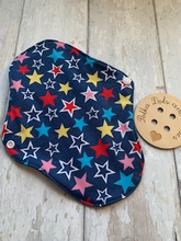 Load image into Gallery viewer, My sanitary towels are made from a top layer of organic cotton jersey that draws the liquid away, the inner core is organic bamboo fleece velour fabric which is highly absorbent, then a layer of PUL which is a breathable waterproof fabric and then of course pretty cotton fabric on the bottom. These high quality, eco friendly fabrics are anti-bacterial, anti-odour and therefore kind to your skin as well as the environment. They are secured with a plastic snap. Washing Instructions - it is best to wash thes