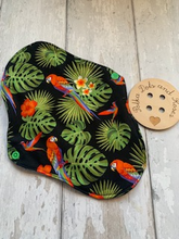 Load image into Gallery viewer, My sanitary towels are made from a top layer of organic cotton jersey that draws the liquid away, the inner core is organic bamboo fleece velour fabric which is highly absorbent, then a layer of PUL which is a breathable waterproof fabric and then of course pretty cotton fabric on the bottom. These high quality, eco friendly fabrics are anti-bacterial, anti-odour and therefore kind to your skin as well as the environment. They are secured with a plastic snap. Washing Instructions - it is best to wash thes