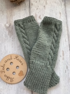 Merino wool is naturally fine, soft and incredibly warm.   These are designed to be worn all day and keep your wrists, hands and fingers (even though they’re not covered) warm.Will fit all hand sizes with a hole for your thumb.  They are great if you suffer from poor circulation or Raynauds.  Lovingly hand knitted by my wonderful mum ♥️