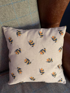 A gorgeous linen/cotton mix cushion with a large bee print on the front, with mini print fabric on the reverse. This measures approx 40x40cm and can be washed (on a hand wash or wool wash) as the covers are zipped and the inner can be removed.