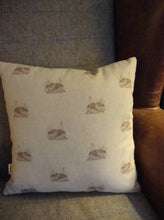 Load image into Gallery viewer, A gorgeous linen/cotton mix cushion with a large Hedgehog print on the front, with mini print fabric on the reverse. This measures approx 40x40cm and can be washed (on a hand wash or wool wash) as the covers are zipped and the inner can be removed.
