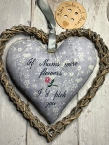 ' If Mums were flowers I'd pick you'  These large hanging hearts look good all year round hung on a wall, door handle or gifted around the neck of a bottle of wine, fizz or bubble bath. They measure approx. 20x20cm  Available on their own, or in a wicker heart.  I have other floral fabrics available, so if none appeal, please email me, but I have chosen ones where the text is likely to show the best.