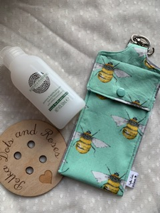 These hand sanitiser anti-bacterial gel holders come with a key ring and lobster clasp so they can be attached to your lanyard, hand bag or belt loop so they are always to hand (no pun intended!) lined with a matching/funky cotton fabric.  They measure approximately 7cm x 14cm and are designed so most 50ml gel bottles fit inside.  They are available with or without the gel included.